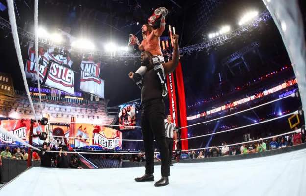 Aj Styles reacciona a su victoria por los campeonatos por parejas en Wrestlemania