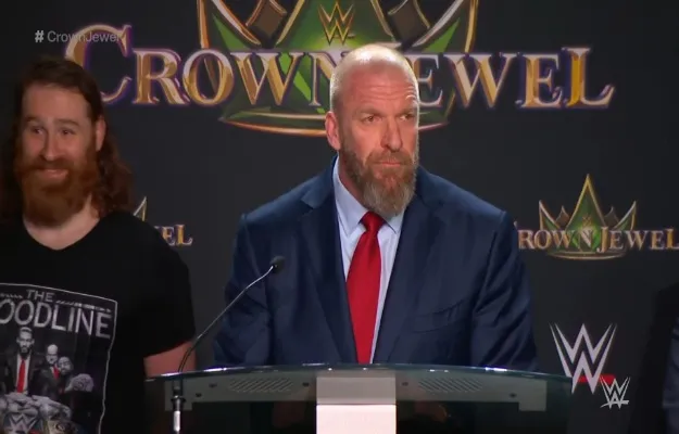 Triple H Roman Reigns