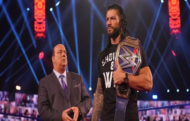 WWE ROMAN REIGNS PAUL HEYMAN